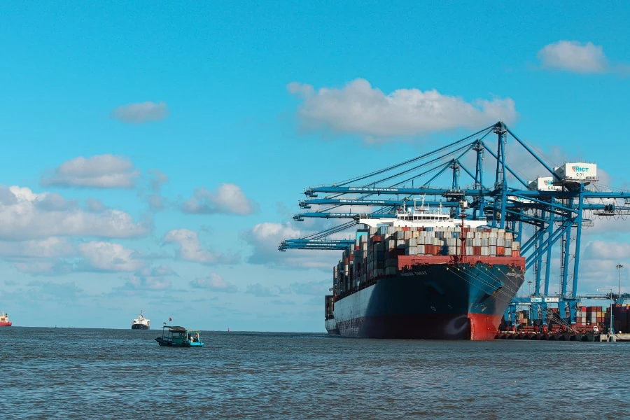 Container ship loading at port